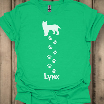 Lynx avec empreintes de pattes blanches T-shirt tendance